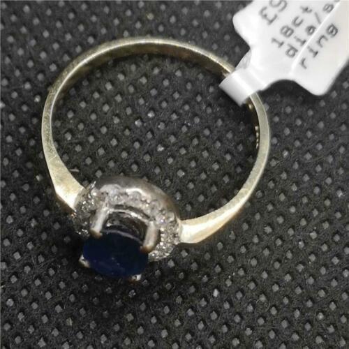 18ct yellow gold sapphire and diamond ring, featuring a central sapphire gemstone surrounded by sparkling diamonds.