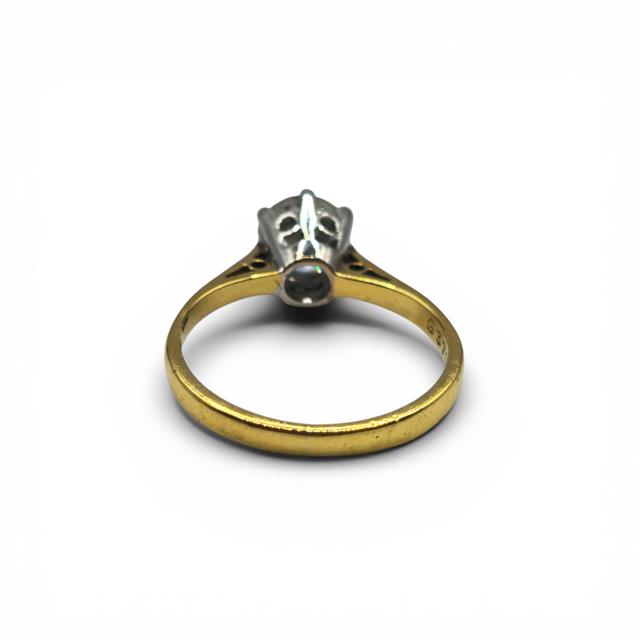 18ct yellow gold single diamond ring with a sparkling diamond set in a sleek band.