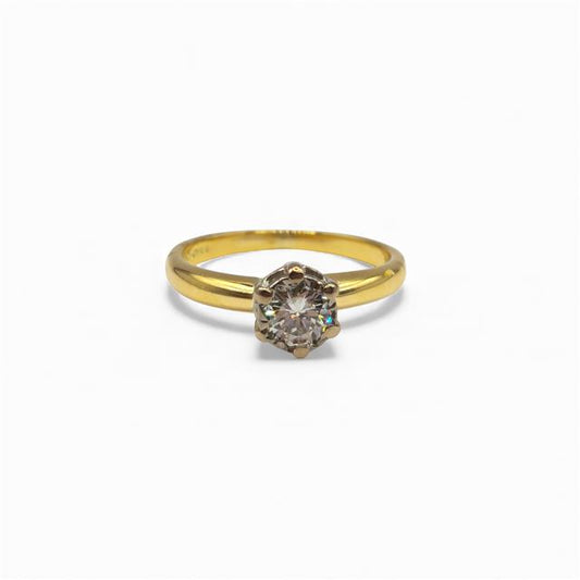 18ct yellow gold diamond ring with a single sparkling stone, showcasing elegant craftsmanship and a classic design.