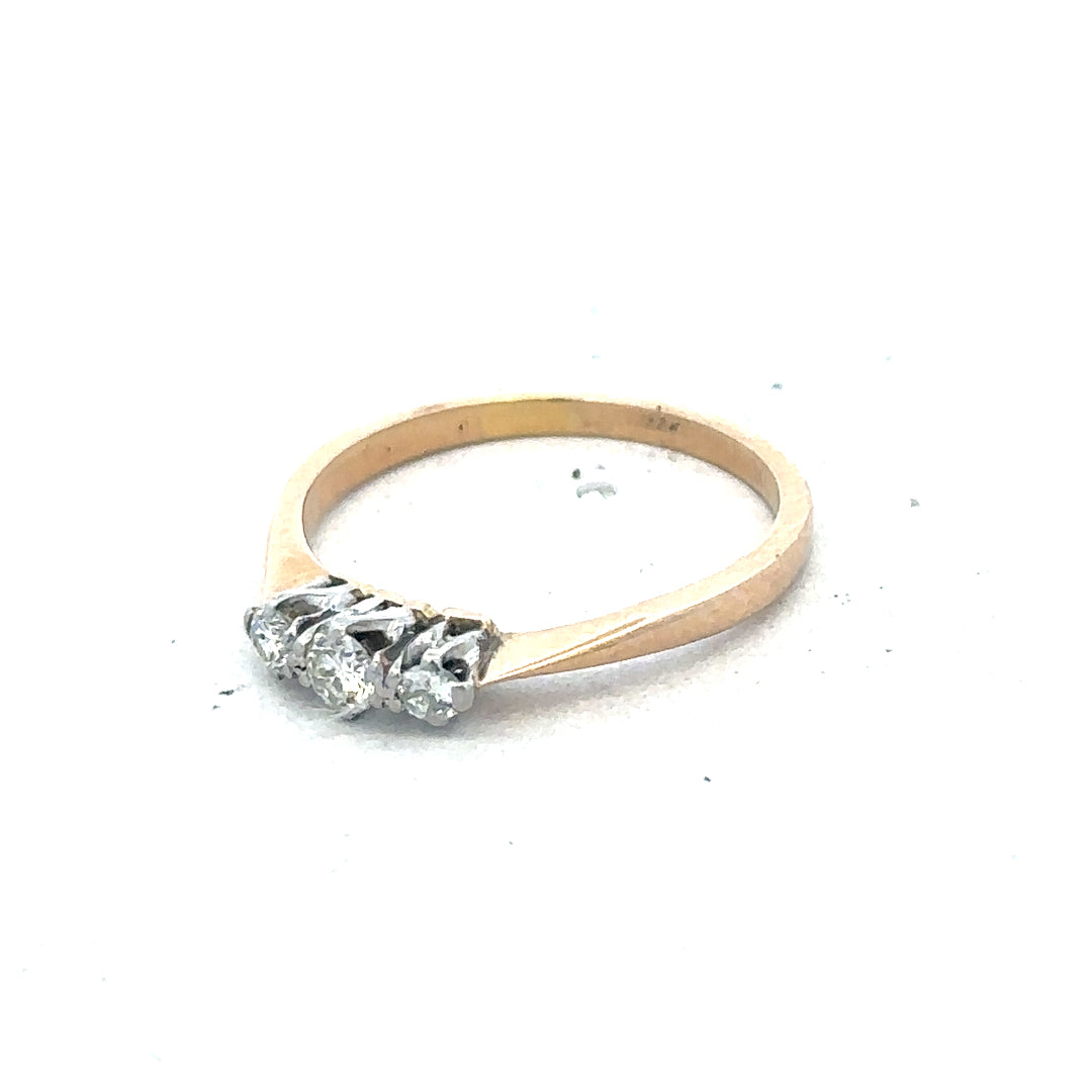18ct yellow gold three diamond ring showing a sleek band with three sparkling diamonds, unbranded jewelry for elegant style.