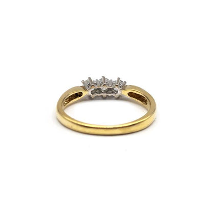18ct yellow gold ring with three diamonds, featuring a sleek and elegant design, unbranded jewelry piece.