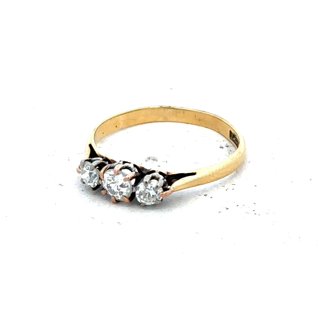 18ct yellow gold ring with three diamonds in size L, Unbranded jewelry shown with detailed gold band and sparkling diamonds.