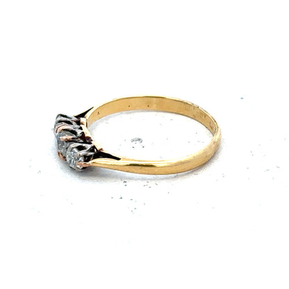 18ct yellow gold three diamond ring in size L, featuring elegant design and sparkling gemstones.