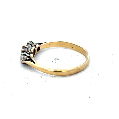 18ct yellow gold three diamond ring in size L with a simple, elegant design, featuring sparkling diamonds on a classic band.