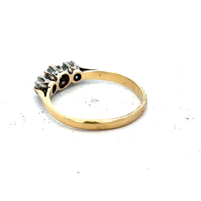 18ct yellow gold three diamond ring in size L, featuring a sleek band with sparkling diamonds, unbranded jewelry accessory.