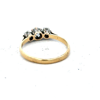 18ct yellow gold three diamond ring in size L, featuring a sleek design and sparkling diamonds, unbranded jewelry piece.