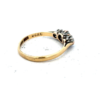 18ct yellow gold three-diamond ring in size L, featuring a classic and elegant design with sparkling diamond accents.
