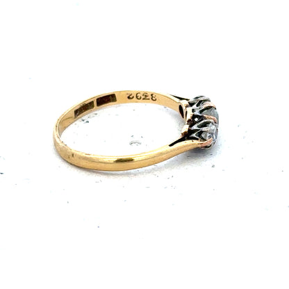 18ct yellow gold three diamond ring in size L, showcasing elegant jewelry craftsmanship and sparkling gemstone accents.