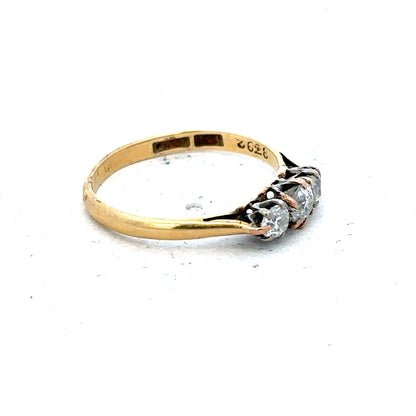 18ct yellow gold three-diamond ring in size L, featuring a classic design with sparkling diamonds on a polished gold band.