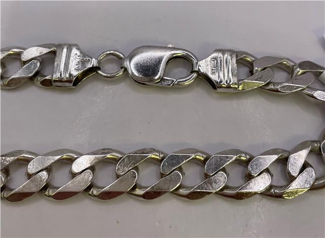 Silver bracelet with intricate design, crafted from 925 sterling silver, featuring a stylish unbranded jewelry piece.
