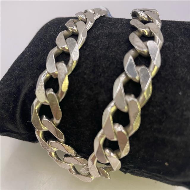 Silver bracelet made of 925 sterling silver with a sleek, polished finish, featuring a simple and elegant design.