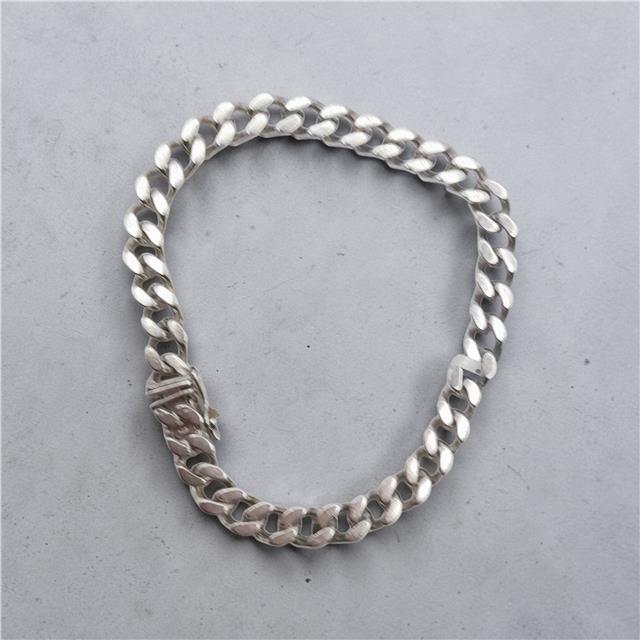 925 silver curb bracelet, unbranded, 24cm length, 37.9g weight, detailed chain design, shown on a plain background.