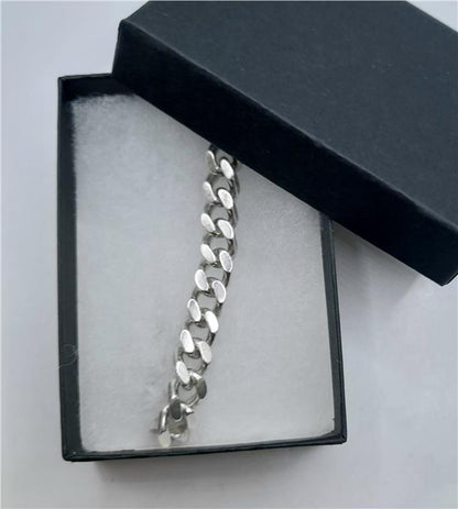 925 silver curb bracelet weighing 37.9g and measuring 24cm, featuring a classic chain design, unbranded jewelry accessory.