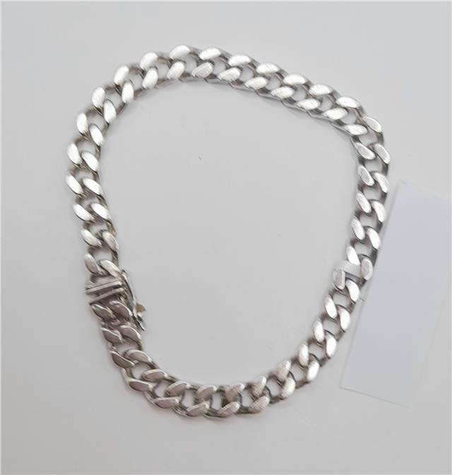 925 silver curb bracelet weighing 37.9g and 24cm long, unbranded jewelry with a sleek chain design.