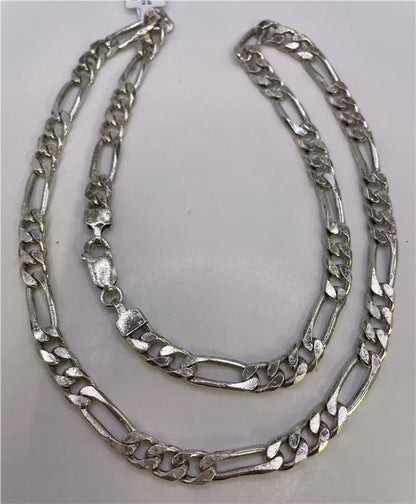 925 silver Figaro chain, unbranded jewelry chain with interlocking links, shown in a close-up view.