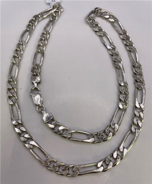 925 silver Figaro chain, unbranded jewelry chain with interlocking links, shown in a close-up view.