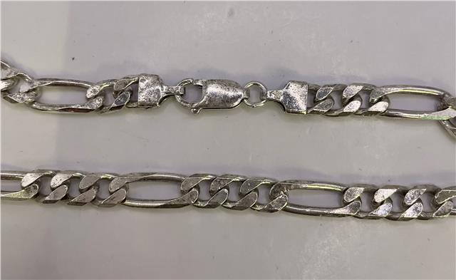 925 silver figaro chain, unbranded, showing a close-up of the elegant, polished chain with distinctive flattened links.