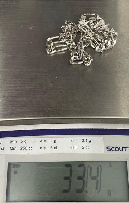 925 silver figaro chain featuring interlocked links, unbranded jewelry accessory with a polished finish.