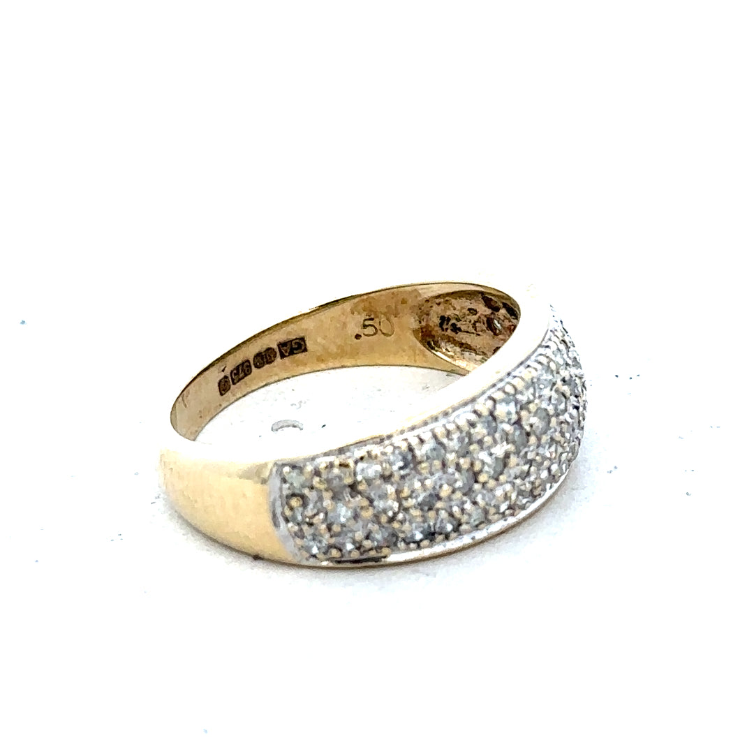 9ct diamond ring with 1/2 carat total weight, size M, unbranded, showcasing a sparkling diamond set in a sleek band.