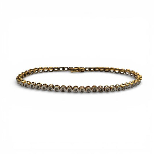 9ct diamond line bracelet with sparkling diamonds on a sleek gold band, unbranded jewelry accessory.