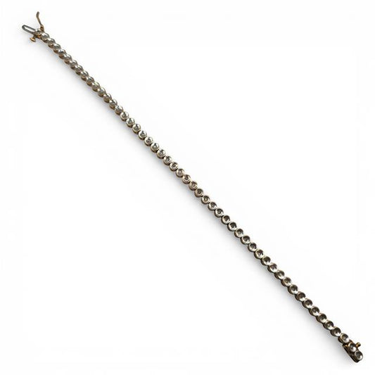 9ct diamond line bracelet with sparkling diamonds, showcasing a sleek and elegant unbranded jewelry design.