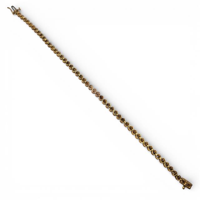 Elegant 9ct diamond line bracelet with sparkling diamonds, unbranded jewelry piece showcasing a delicate, classic design.