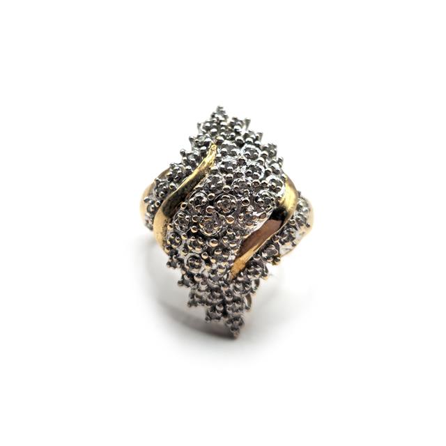 Unbranded 9ct diamond ring featuring a sparkling central diamond set in a sleek band, displayed on a neutral background.