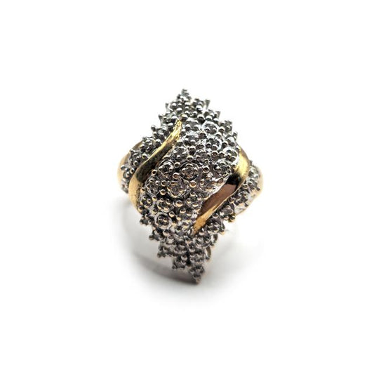 Unbranded 9ct diamond ring featuring a sparkling central diamond set in a sleek band, displayed on a neutral background.