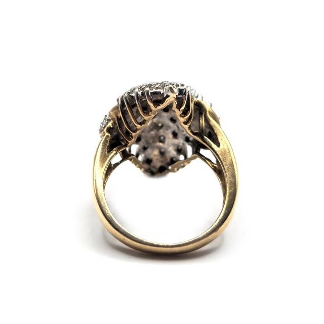 Unbranded 9ct diamond ring featuring a central diamond set in a sleek gold band, showcasing elegant jewelry design.
