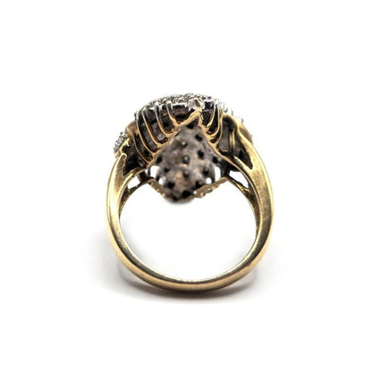 Unbranded 9ct diamond ring featuring a central diamond set in a sleek gold band, showcasing elegant jewelry design.