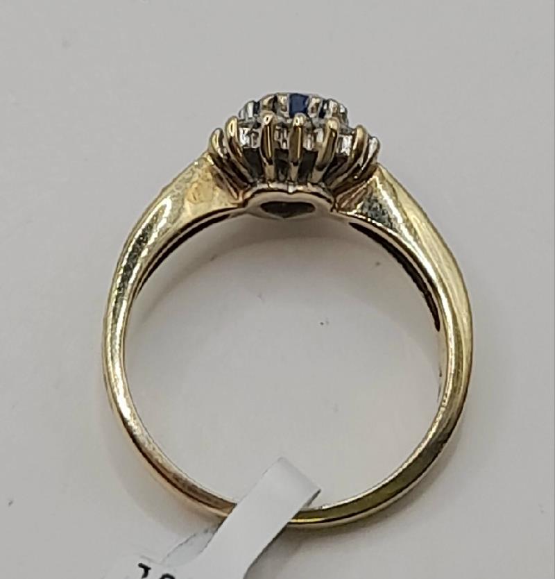 9ct diamond ring in size J1/2 with 2.8g, featuring sparkling diamonds on a sleek band, unbranded jewelry accessory.