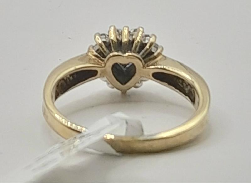 9ct diamond ring in size J1/2, featuring sparkling diamonds and a sleek band, weighs 2.8g. Unbranded jewelry.