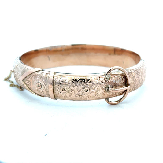 Unbranded 9ct gold bracelet bangle weighing 17.9g, featuring a smooth, polished finish and classic design.