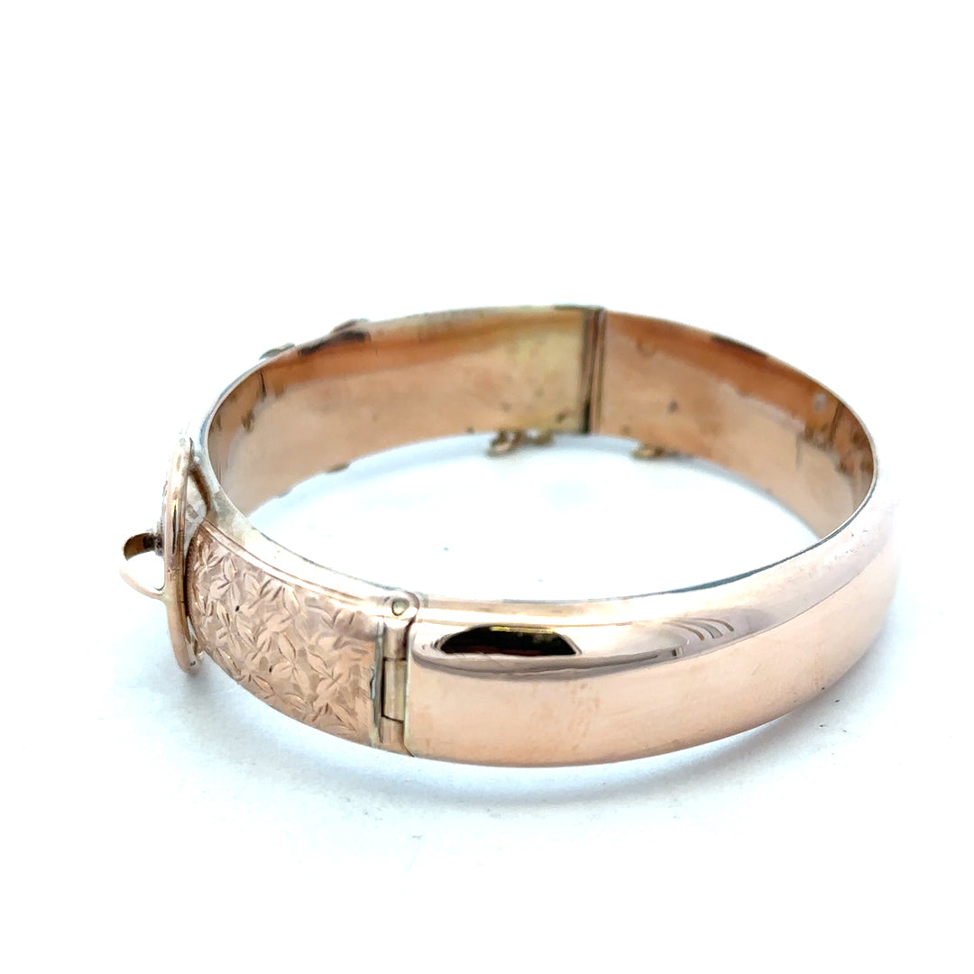 9ct gold bracelet bangle weighing 17.9g, unbranded, with a smooth polished finish and classic design.