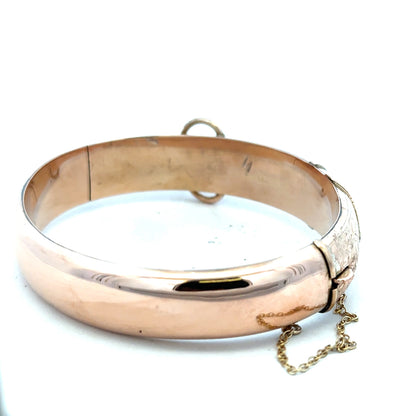 9ct gold bracelet with a smooth, polished finish, weighing 17.9g, featuring a classic bangle design.