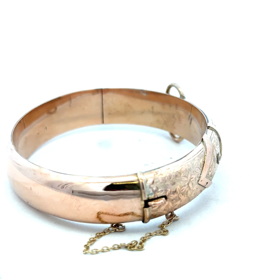 9ct gold bracelet bangle weighing 17.9g, unbranded, with a smooth polished finish, displayed on a neutral background.