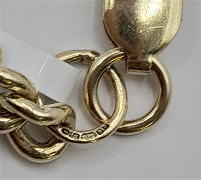 Gold bracelet in 9ct gold, 12.6g, 21cm length, unbranded jewelry showing a sleek, polished design.