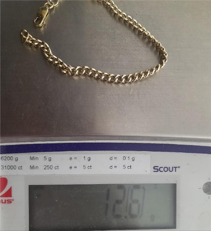 9ct gold bracelet weighing 12.6g and 21cm in length, unbranded jewelry with a sleek, polished finish.