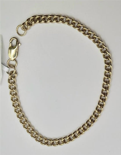 Gold bracelet in 9ct gold, weighs 12.6g, measures 21cm, with a sleek design, unbranded jewelry accessory.