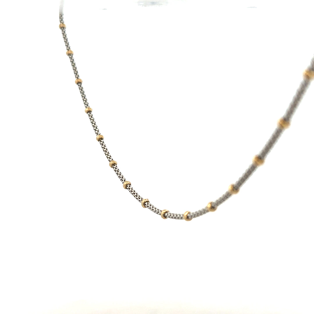 9ct gold chain weighing 5.6g, featuring a classic link design, unbranded jewelry accessory displayed on a neutral background.