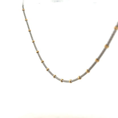 9ct gold chain weighing 5.6g, featuring a classic link design, unbranded jewelry accessory displayed on a neutral background.