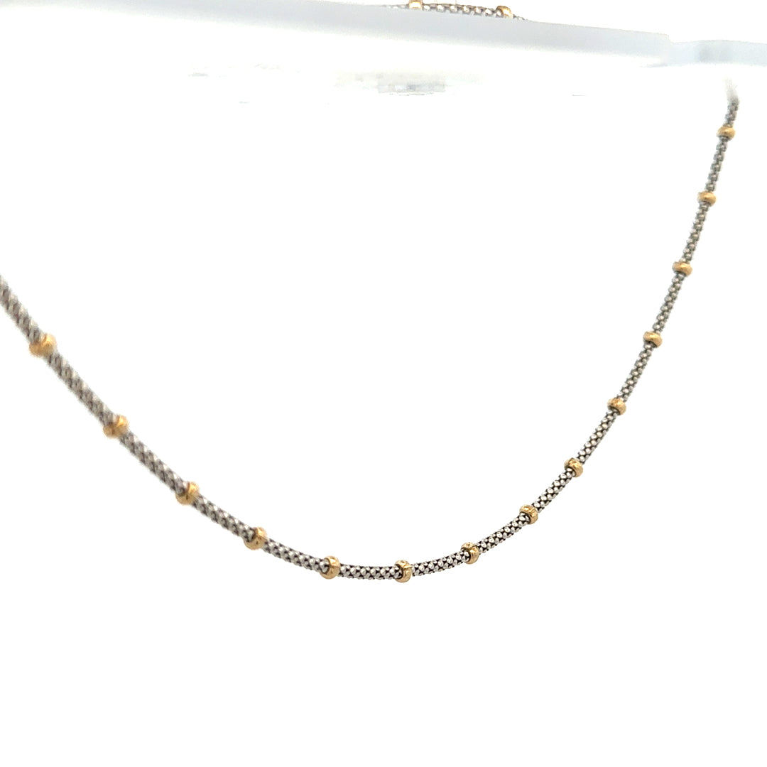 Unbranded 9ct gold chain weighing 5.6g, with a simple and elegant design, shown in a close-up view.