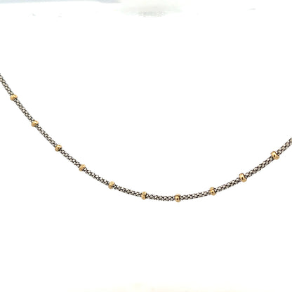 9ct gold chain weighing 5.6g, unbranded, with a detailed chain link design visible in the image.