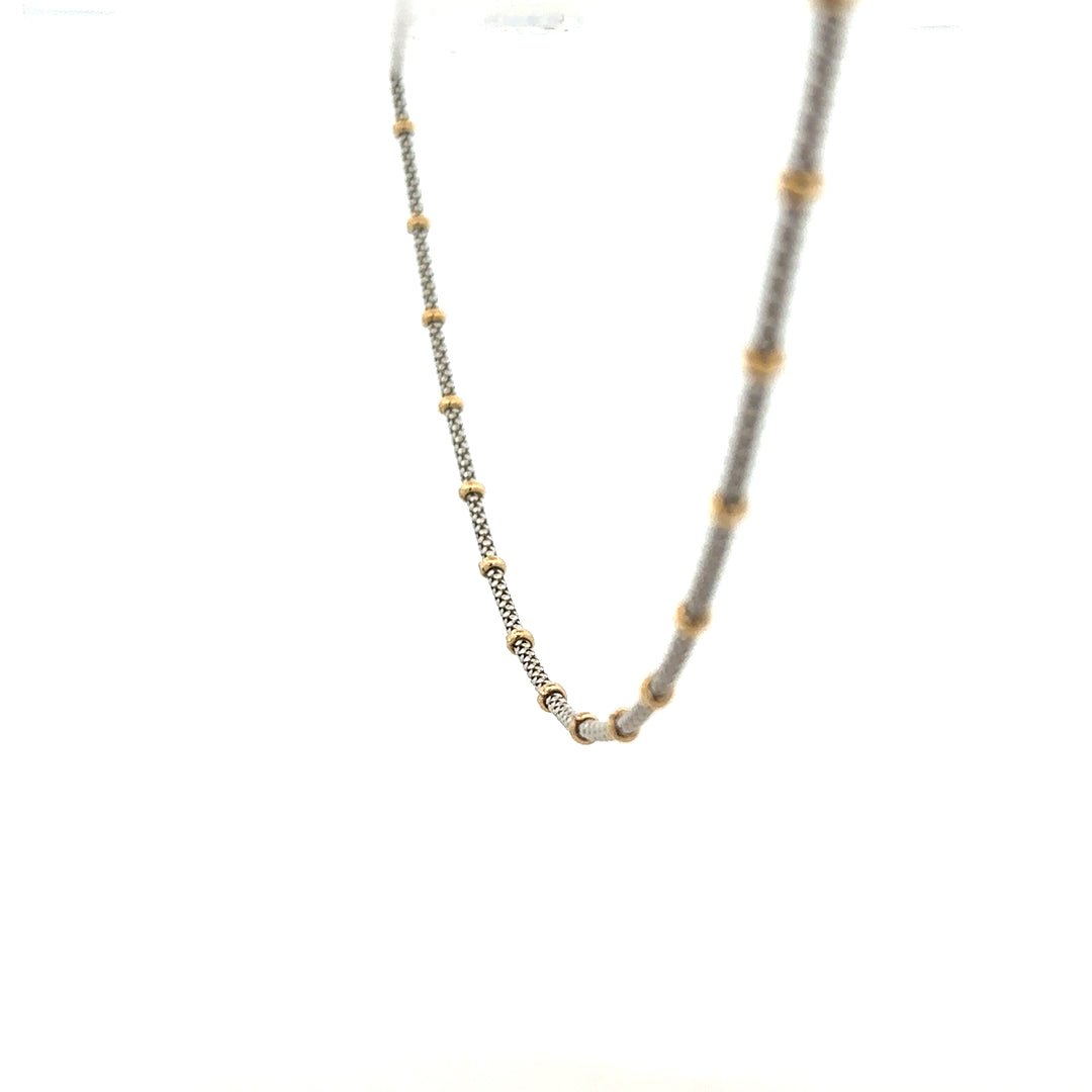 9ct gold chain weighing 5.6g, featuring a classic design, crafted in unbranded quality jewelry, displayed on a neutral background.