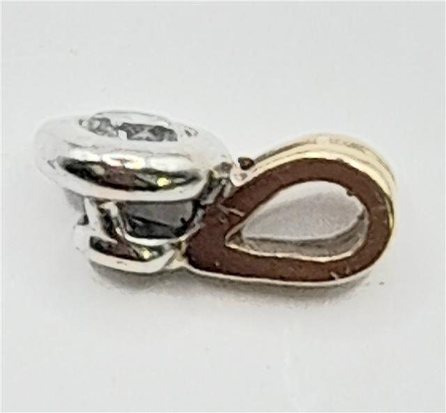 9ct gold diamond pendant with delicate design, weighing 0.7g, showcasing sparkling diamonds in a classic pendant style.