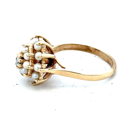 9ct gold diamond ring featuring a sparkling central diamond and a polished gold band. Elegant and timeless jewelry piece.