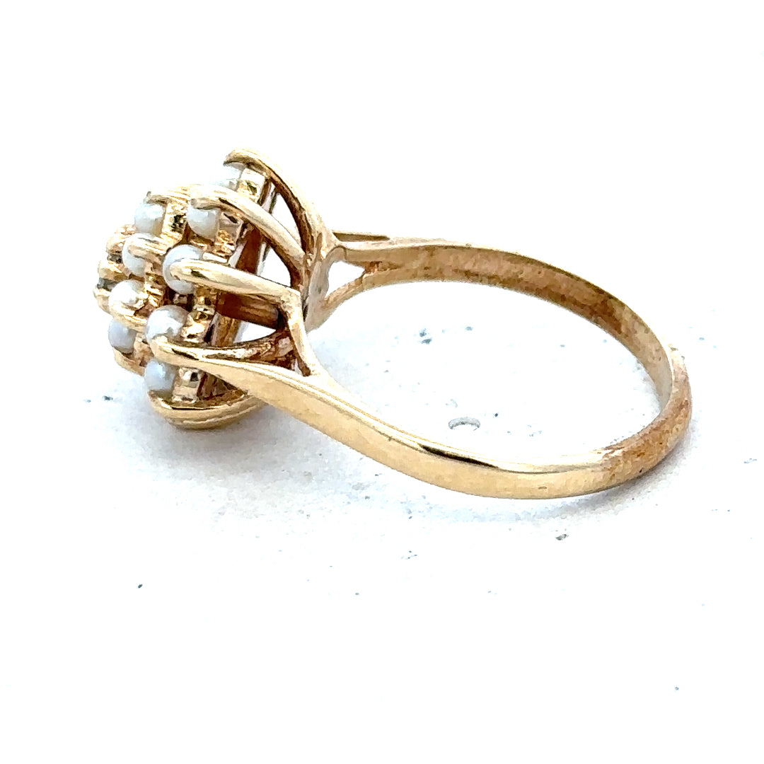 9ct gold diamond ring featuring a sparkling central diamond and a classic band design for elegant jewelry.