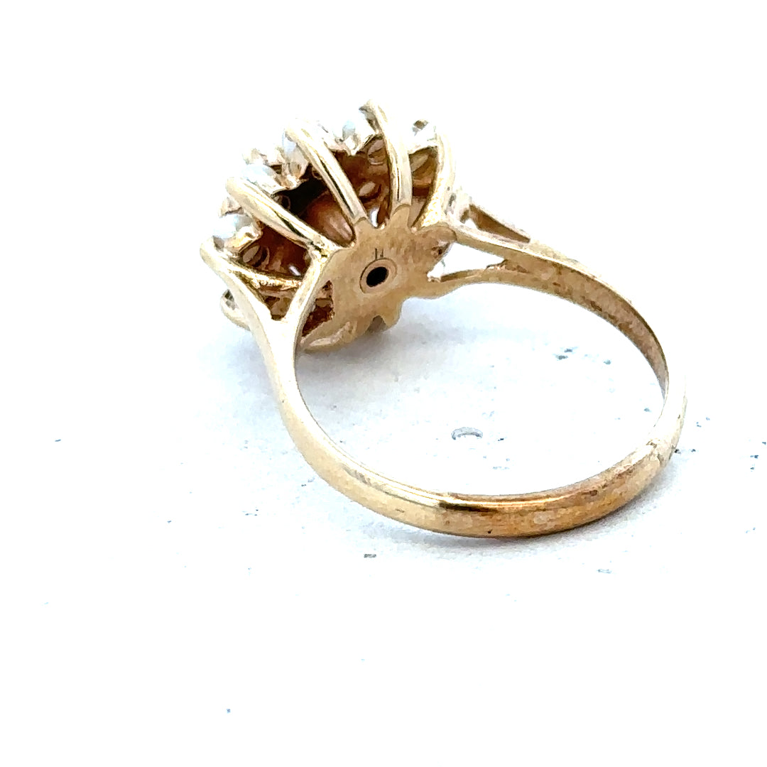 9ct gold diamond ring featuring a sparkling central diamond and a sleek gold band, designed for elegant jewelry style.