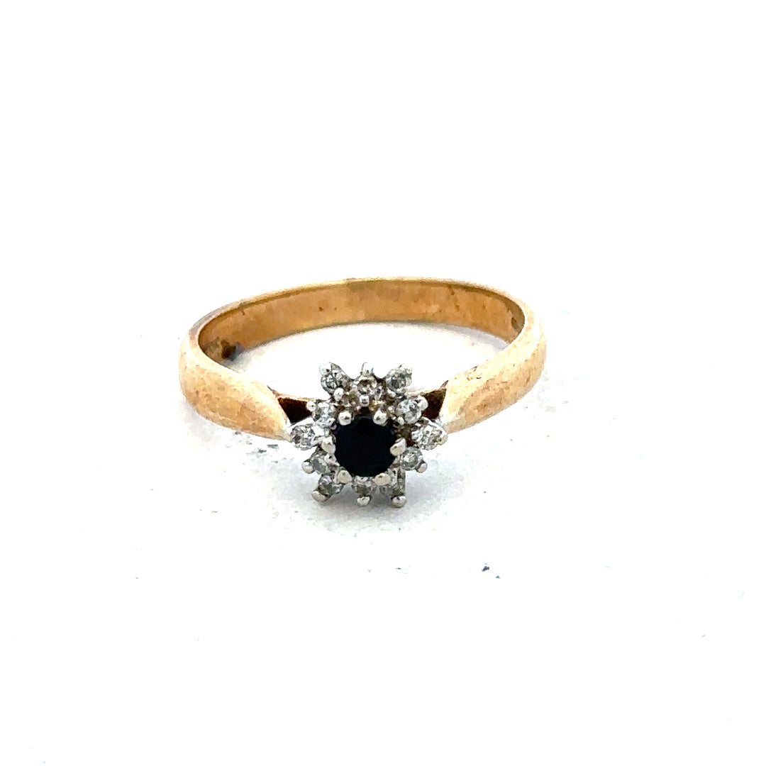 9ct gold diamond ring featuring a sparkling diamond set in a sleek gold band, simple and elegant jewelry piece.
