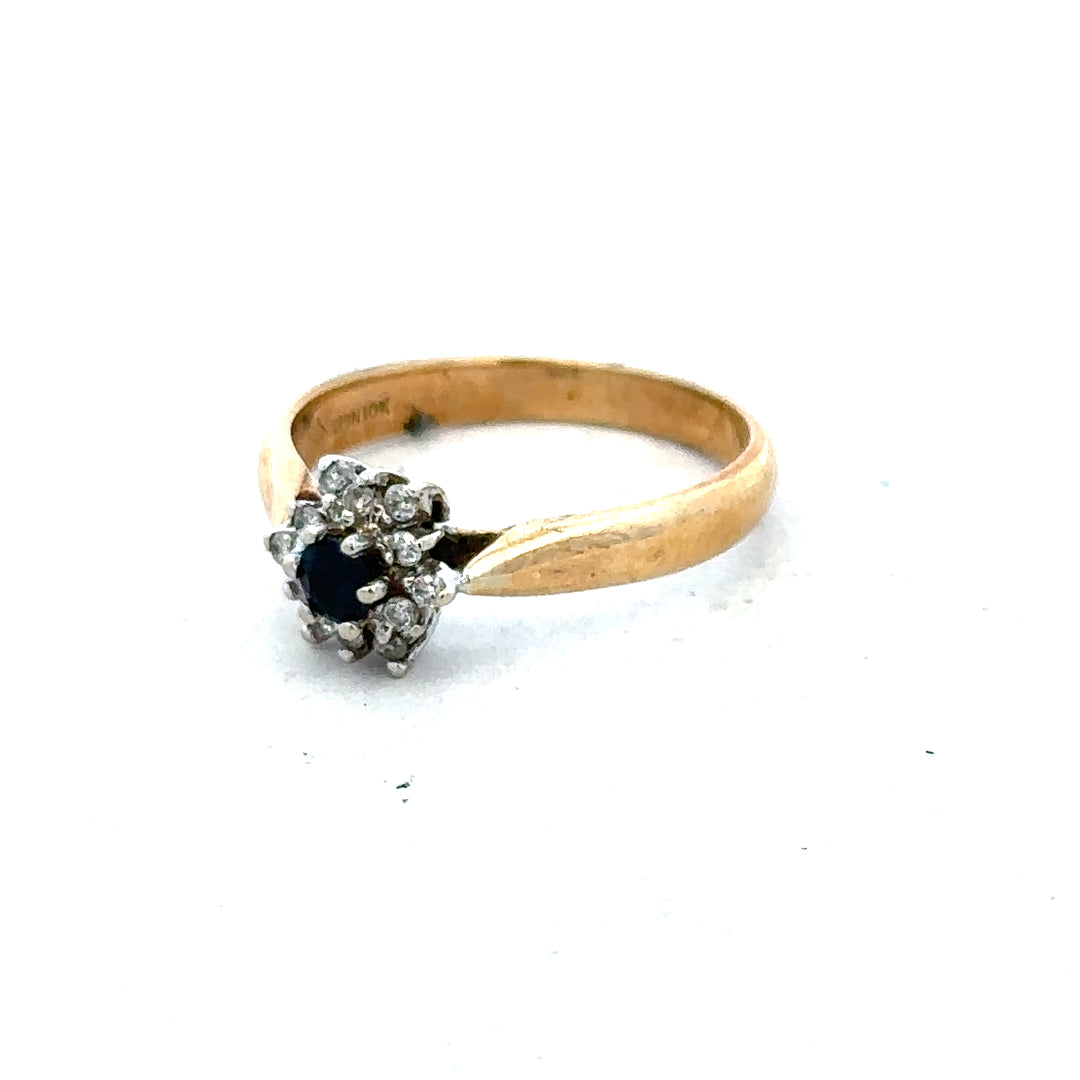 9ct gold diamond ring featuring a sparkling central diamond and elegant band, showcasing fine craftsmanship and timeless style.
